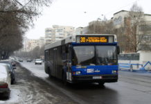 Shoulder-to-Shoulder, these Detroit workers have no choice but to ride the bus (NYT)